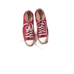 Red and white Converse sneakers. Worn but in good shape.